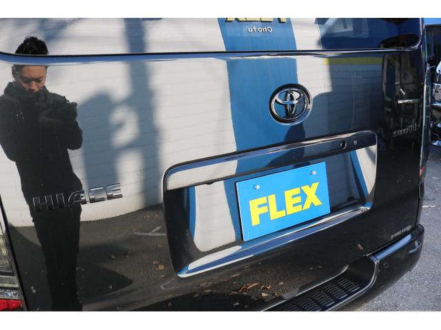 ハイエースバン スーパーＧＬ　ダークプライムＩＩ　アルパイン　ＢＩＧ－Ｘ１１インチナビメカレスＥＴＣ２．０ベッドキットＦＬＥＸボンネットフロントスポイラーオーバーフェンダーＬＥＤテールＦＬＥＸ１８インチアルミヨコハマタイヤメッキ部ブラック塗装（31枚目）