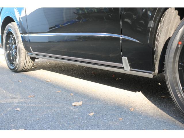 ハイエースバン スーパーＧＬ　ダークプライムＩＩ　アルパイン　ＢＩＧ－Ｘ１１インチナビメカレスＥＴＣ２．０ベッドキットＦＬＥＸボンネットフロントスポイラーオーバーフェンダーＬＥＤテールＦＬＥＸ１８インチアルミヨコハマタイヤメッキ部ブラック塗装（32枚目）