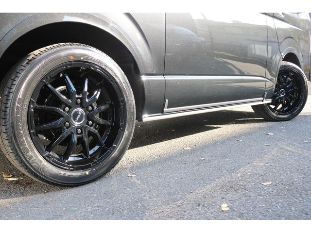 ハイエースバン スーパーＧＬ　ダークプライムＩＩ　アルパイン　ＢＩＧ－Ｘ１１インチナビメカレスＥＴＣ２．０ベッドキットＦＬＥＸボンネットフロントスポイラーオーバーフェンダーＬＥＤテールＦＬＥＸ１８インチアルミヨコハマタイヤメッキ部ブラック塗装（34枚目）