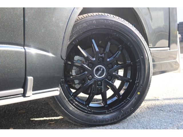 ハイエースバン スーパーＧＬ　ダークプライムＩＩ　アルパイン　ＢＩＧ－Ｘ１１インチナビメカレスＥＴＣ２．０ベッドキットＦＬＥＸボンネットフロントスポイラーオーバーフェンダーＬＥＤテールＦＬＥＸ１８インチアルミヨコハマタイヤメッキ部ブラック塗装（36枚目）