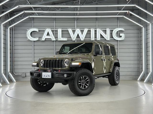 ジープ・ラングラーアンリミテッド ルビコンＸ　３．６Ｌ　新色４１　日本未発売グレード　スカイトップ　エクストリームリーコン３５タイヤＰＫＧ　フロント１２ｗａｙパワーシート　３５インチタイヤ　ブラックナッパレザーシート　１２．３インチモニター　ワイヤレスアップルカープレイ　シートヒーター（2枚目）