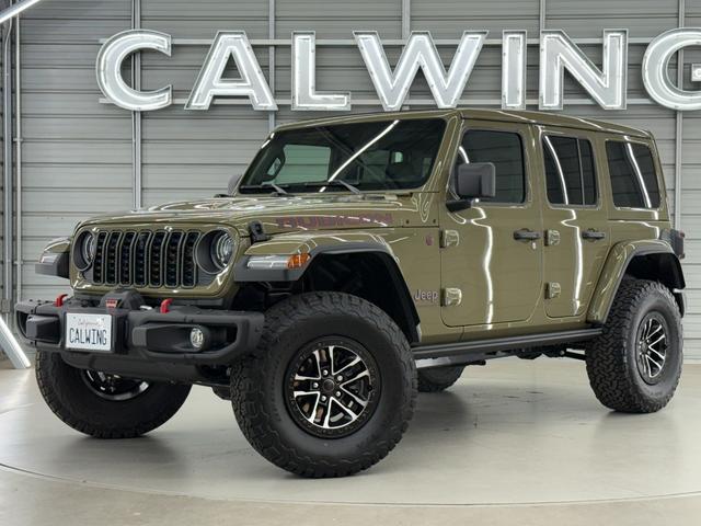 ジープ・ラングラーアンリミテッド ルビコンＸ　３．６Ｌ　新色４１　日本未発売グレード　スカイトップ　エクストリームリーコン３５タイヤＰＫＧ　フロント１２ｗａｙパワーシート　３５インチタイヤ　ブラックナッパレザーシート　１２．３インチモニター　ワイヤレスアップルカープレイ　シートヒーター（9枚目）