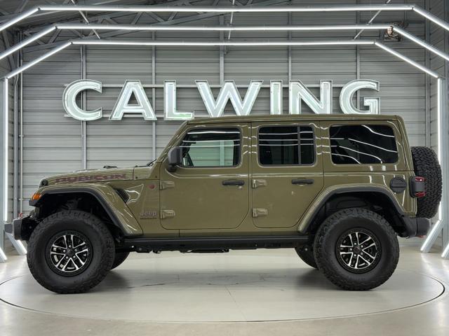 ジープ・ラングラーアンリミテッド ルビコンＸ　３．６Ｌ　新色４１　日本未発売グレード　スカイトップ　エクストリームリーコン３５タイヤＰＫＧ　フロント１２ｗａｙパワーシート　３５インチタイヤ　ブラックナッパレザーシート　１２．３インチモニター　ワイヤレスアップルカープレイ　シートヒーター（13枚目）