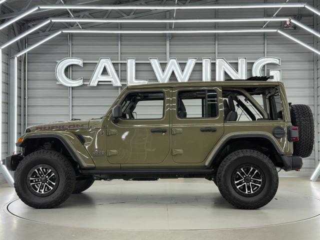 ジープ・ラングラーアンリミテッド ルビコンＸ　３．６Ｌ　新色４１　日本未発売グレード　スカイトップ　エクストリームリーコン３５タイヤＰＫＧ　フロント１２ｗａｙパワーシート　３５インチタイヤ　ブラックナッパレザーシート　１２．３インチモニター　ワイヤレスアップルカープレイ　シートヒーター（27枚目）