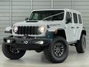 ジープ・ラングラーアンリミテッド ルビコン３９２　Ｖ８　スカイトップ　生産終了決定　レッドインテリア　１２．３インチモニター　純正可変マフラー　１２ｗａｙパワーシート　シートヒーター　ワイヤレスアップルカープレイ　ビルシュタインアルミダンパー　３．２インチリフトアップ（6枚目）