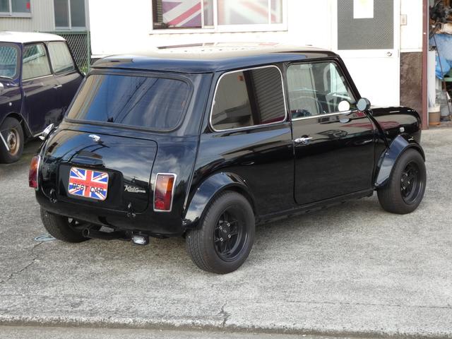 ＭＩＮＩ クーパー１．３　前後バンパーレス仕様・ＦＣＲキャブ・ＬＣＢ・ハイリフトロッカアーム・ＲＣ４０センターマフラー・センターメーター・モトリタ・ＷＡＫＯ製ＣＤＩ・コイルサス・４ポッドキャリパー・前後ネガキャンキット・ＥＴＣ（2枚目）