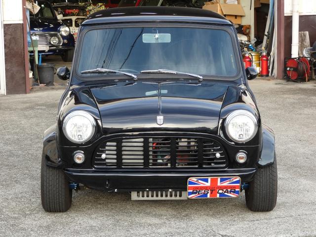 ＭＩＮＩ クーパー１．３　前後バンパーレス仕様・ＦＣＲキャブ・ＬＣＢ・ハイリフトロッカアーム・ＲＣ４０センターマフラー・センターメーター・モトリタ・ＷＡＫＯ製ＣＤＩ・コイルサス・４ポッドキャリパー・前後ネガキャンキット・ＥＴＣ（3枚目）
