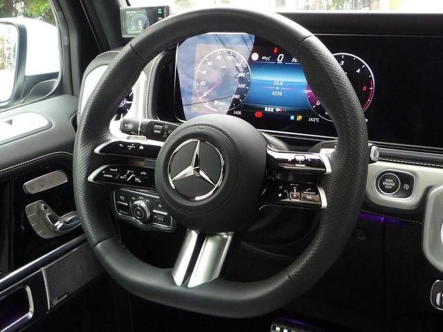 Gクラス G450d ローンチエディション ワンオーナー 左ハンドル プラチナムホワイトレザー ガラスサンルーフ キーレスゴー ブルメスターサウンドシステム 360°カメラ ベンチレーション ステアリングヒーター 同色スペアタイヤリング(13枚目)