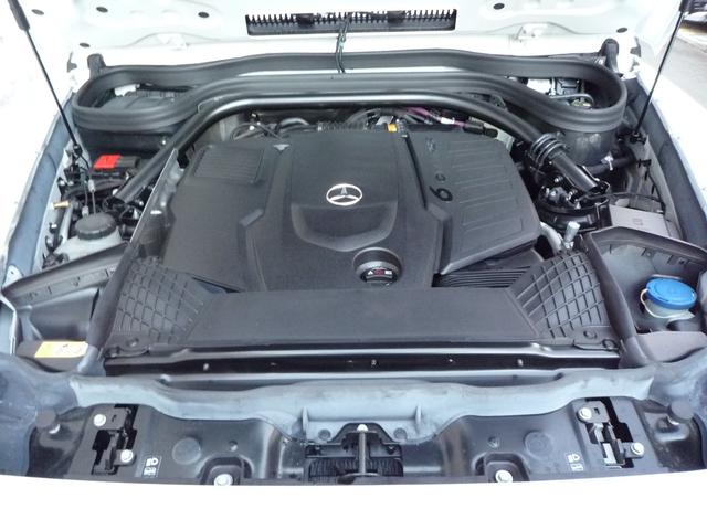 Gクラス G450d ローンチエディション ワンオーナー 左ハンドル プラチナムホワイトレザー ガラスサンルーフ キーレスゴー ブルメスターサウンドシステム 360°カメラ ベンチレーション ステアリングヒーター 同色スペアタイヤリング(34枚目)