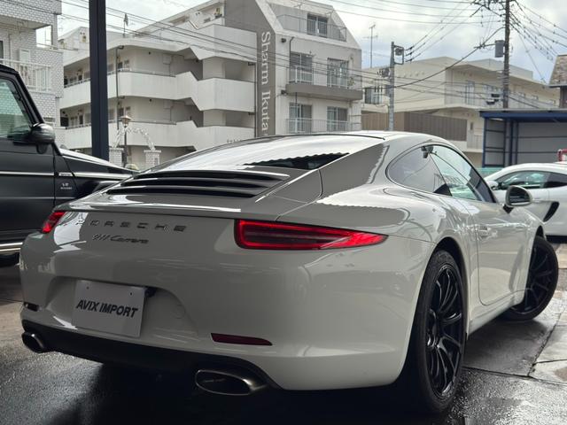 ９１１ ９１１カレラ（Ｔｙｐｅ９９１．１）　前期最終　左Ｈ　正規Ｄ車　７速ＰＤＫ　黒革　シートヒーター　社外フローティングナビ　ＣａｒＰｌａｙ　Ｂカメラ　バイキセノンＨＬ　スポーツステアリング　電動格納ミラー　赤キャリパー　社外２０インチＡＷ（2枚目）