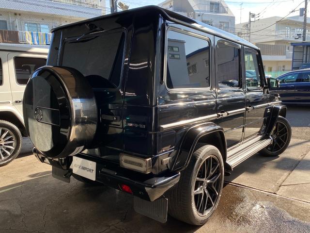 Gクラス G63 AMG 正規D車 デジーノEXCインテリアPKG SR ポーセレン/黒革(designo) シートヒーター&ベンチレーター 純正HDDナビ地デジ harman/kardon Bカメラ&Sカメラ&PTS ディストロ&BSA 赤キャリパー 純正21AW(3枚目)
