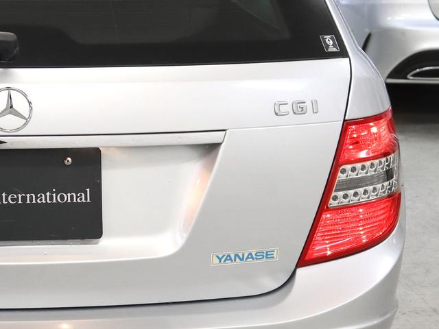 C200ワゴン中期型AVGターボE/G 黒革AMGスポーツP 後期ターボエンジン オートライト アルミホイール パワーシート キーレスエントリー 地デジ 純正ナビ ミュージックレジスター ETC オートエアコン コマンドシステム 衝突安全ボディ マニュアルモード(48枚目)