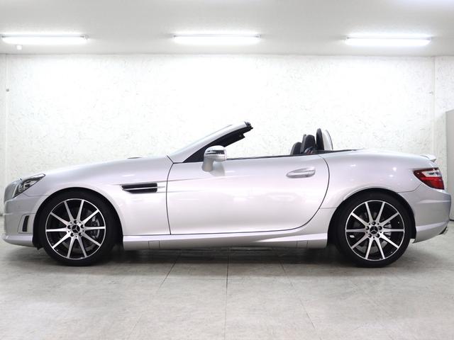 ＳＬＫ ＳＬＫ２００ブルーエフィシェンシー　ＡＭＧスポーツＰＫＧ　ＳＬＫ５５スタイルフロントフェイス　リアスポイラー　パノラミック電動バリオルーフ　ＦＯＸ製クワッドマフラー　サンリフレクティングレザー　シートヒーター　エアスカーフ　純正ナビ（7枚目）