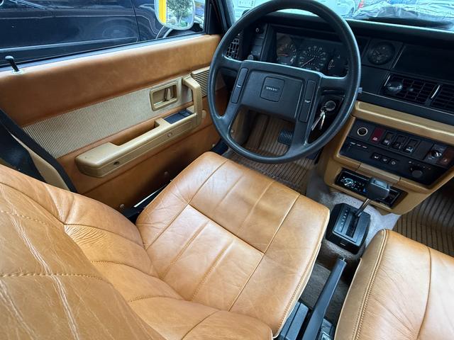 240 左ハンドル DL フルカスタム ブラウンレザー 角目四灯 メッキリング メッキミラー 社外オーディオ バックカメラ ETC パワーウィンドウ シートヒーター 保証付(23枚目)