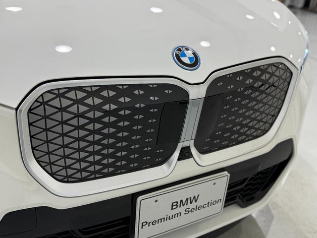 iX1 eDrive 20 Mスポーツ アルカンタラシート ヘッドアップディスプレイ 純正ナビゲーション 360度カメラ 駐車支援システム 電動シート 電動ゲート アンビエントライト シートヒーター(54枚目)