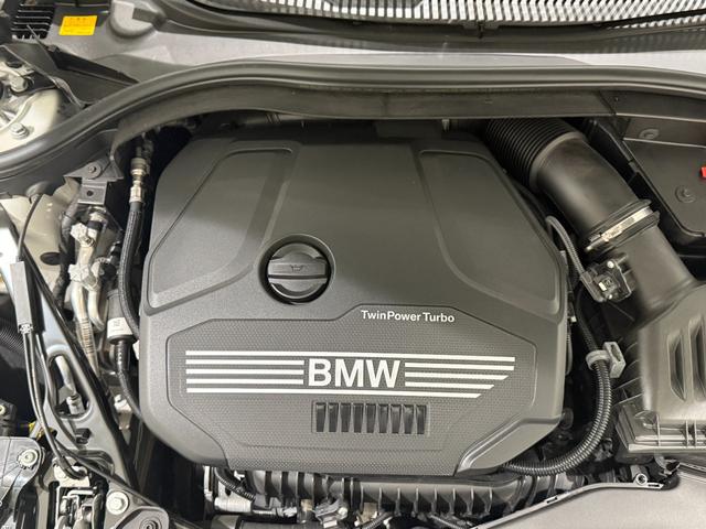 1シリーズ 118i プレイ ヘッドアップディスプレイ 純正ナビゲーション 駐車支援システム アクティブクルーズコントロール Bluetooth 電動シート 電動ゲート オートホールド(65枚目)