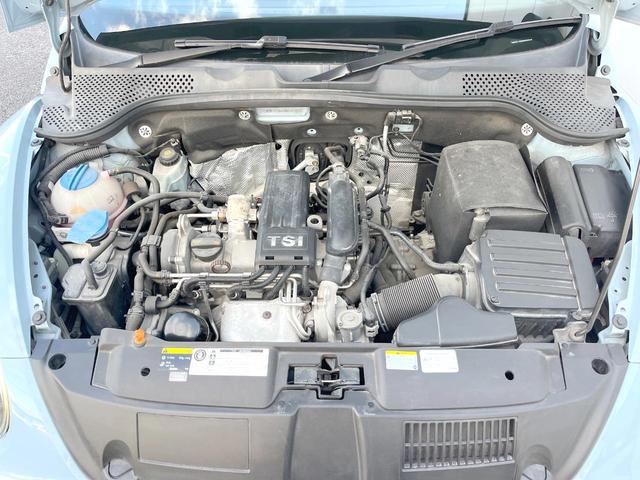 ザ・ビートル デザイン　クラリオン製ナビＴＶ　ＨＩＤヘッドランプ　クルーズコントロール　純正１６インチＡＷ　ＣＤ／ＤＶＤ　Ｂｌｕｅｔｏｏｔｈ再生　革巻きステアリングホイール　ブラックファブリックシート　ＥＴＣ　禁煙車（18枚目）