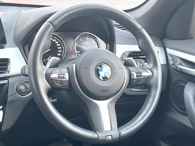 Ｘ１ ｘＤｒｉｖｅ　１８ｄ　Ｍスポーツエディションジョイ＋　ワンオーナー　コンフォートＰＫＧ　アドバンスドアクティブセーフティＰＫＧ　純正ナビ　リアビューカメラ　パワーシート　シートヒーター　パワーバックドア　ＬＥＤヘッド　純正１８インチＡＷ　ＥＴＣ　禁煙車（12枚目）