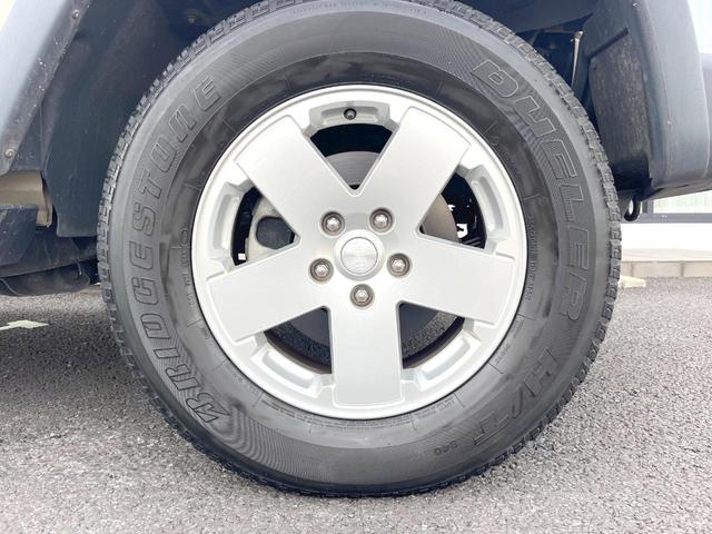 ジープ・ラングラーアンリミテッド スポーツ　Ｐａｎａｓｏｎｉｃ製ナビ　バックカメラ　クルーズコントロール　サイドカメラ　オートエアコン　純正１８インチアルミホイール　ブラックハードトップ　サイドステップ　ＥＴＣ　禁煙車（49枚目）