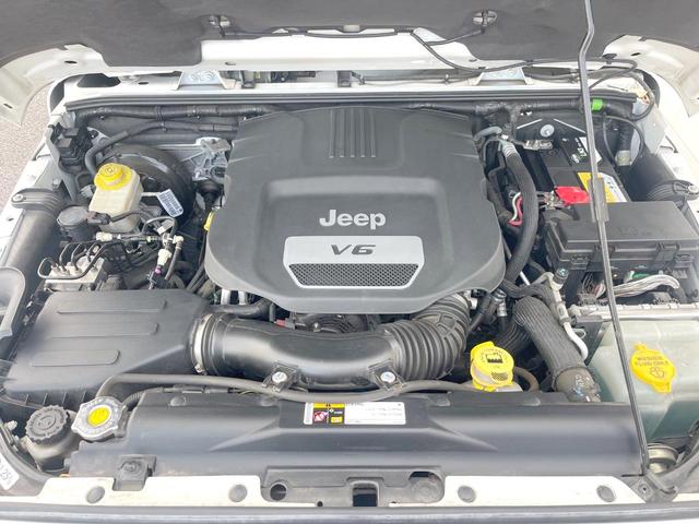 ジープ・ラングラーアンリミテッド サハラ　ＳＡＨＡＲＡ刺繍入革シート　シートヒーター　カロッツェリア製ナビＴＶ　バックカメラ　クルーズコントロール　サイドカメラ　純正１８インチＡＷ　オートエアコン　オートライト　サイドステップ　ＥＴＣ　禁煙車（19枚目）