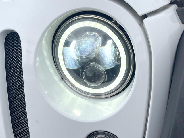 ジープ・ラングラーアンリミテッド スポーツ　Ｐａｎａｓｏｎｉｃ製９型ナビ　ＬＥＤヘッドランプ　フルセグＴＶ　リアビューカメラ　サイドカメラ　オートクルーズコントロール　純正１８インチアルミホイール　革巻きステアリングホイール　ＥＴＣ　禁煙車（13枚目）