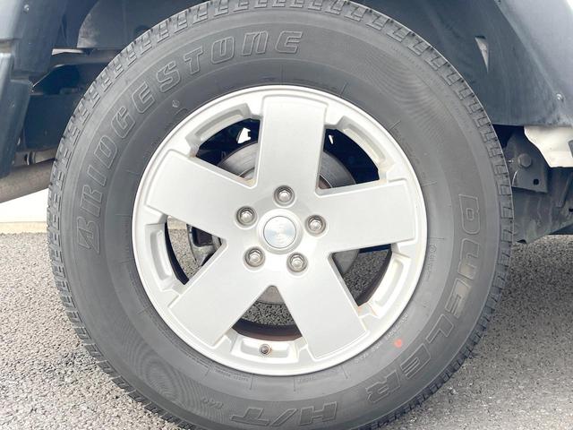 ジープ・ラングラーアンリミテッド スポーツ　Ｐａｎａｓｏｎｉｃ製９型ナビ　ＬＥＤヘッドランプ　フルセグＴＶ　リアビューカメラ　サイドカメラ　オートクルーズコントロール　純正１８インチアルミホイール　革巻きステアリングホイール　ＥＴＣ　禁煙車（44枚目）