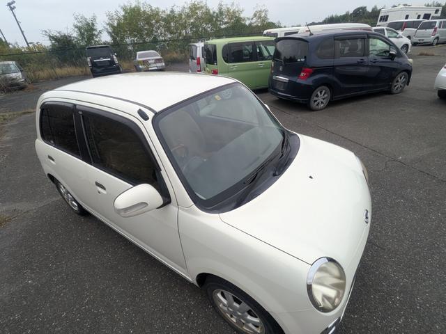 ミラジーノ プレミアムＬ　ＤＶＤ再生可能　パワーウインドウ　盗難防止装置　パワーステアリング　禁煙車　キーレスキー　運転席エアバック　ＳＤナビ　ＡＢＳ　ダブルエアバッグ　ワンセグ　記録簿　電格ドアミラー　ＡＣ（9枚目）