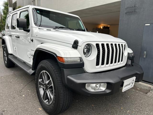 ジープ・ラングラーアンリミテッド サハラ　２．０Ｌ　４ＷＤ　ＡｐｐｌｅｃａｒＰｌａｙ　ＡＬＰＩＮＥサウンド　フロアＭＴモード付８ＡＴ　全周囲カメラ　ドライブレコーダー　ＥＴＣ　フルセグ　本革シート　電動シート　シートヒーター　アルミホイール（21枚目）