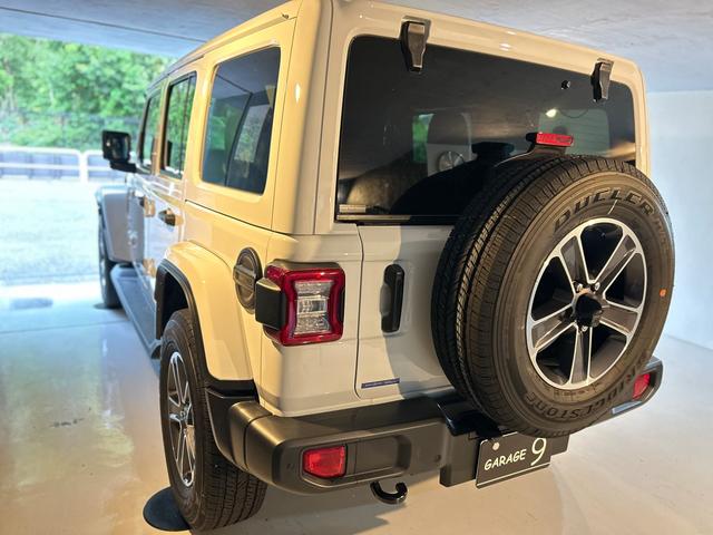 ジープ・ラングラーアンリミテッド サハラ　２．０Ｌ　４ＷＤ　ＡｐｐｌｅｃａｒＰｌａｙ　ＡＬＰＩＮＥサウンド　フロアＭＴモード付８ＡＴ　全周囲カメラ　ドライブレコーダー　ＥＴＣ　フルセグ　本革シート　電動シート　シートヒーター　アルミホイール（74枚目）