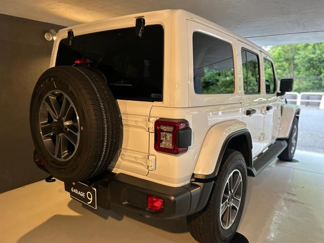 ジープ・ラングラーアンリミテッド サハラ　２．０Ｌ　４ＷＤ　ＡｐｐｌｅｃａｒＰｌａｙ　ＡＬＰＩＮＥサウンド　フロアＭＴモード付８ＡＴ　全周囲カメラ　ドライブレコーダー　ＥＴＣ　フルセグ　本革シート　電動シート　シートヒーター　アルミホイール（76枚目）
