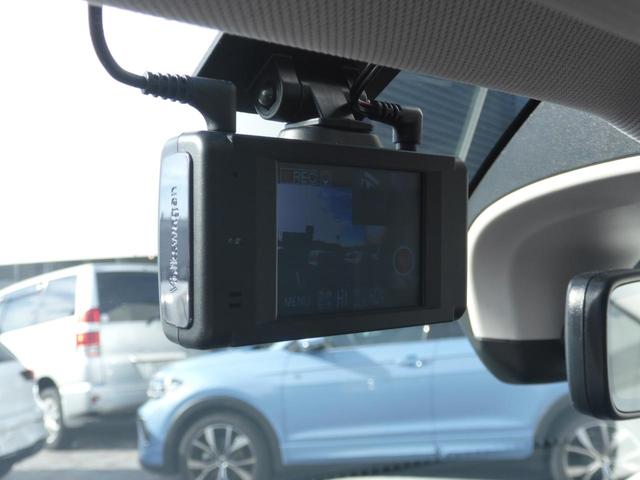 Ｔ－クロス ＴＳＩ　スタイル　Ｄｅｍｏｃａｒ　メモリーナビ　アルミホイール　アダプティブクルーズコントロール　ＥＴＣ２．０　スマートキー　盗難防止システム　横滑り防止装置　記録簿　禁煙車　エアバッグ　エアコン　パワーステアリング（34枚目）