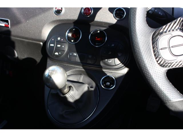 コンペティツィオーネ 認定中古車 右ハンドル 5速マニュアル レコードモンツァマフラー ブラックSabeltシート キセノンヘッドライト 純正17インチAW 2DINナビ ETC付(11枚目)