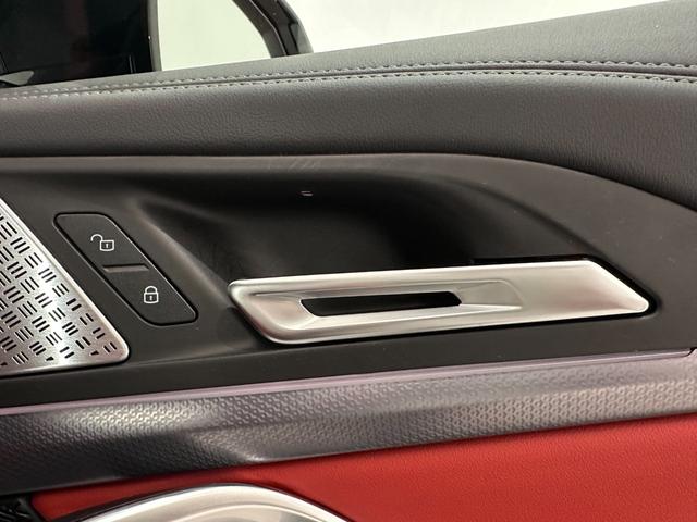 X1 M35i xDrive 全国2年保証ヴェガンザコーラルレッドF電動シートヒーターオートトランクアダプテイブMサスMスポーツブレーキUVカットガラスアダプテイブLEDライトHarman KardonDパークアシスト純正20AW(15枚目)