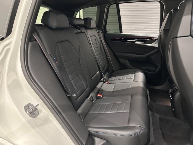 X3 M40d 全国2年保証HarmanKardonサウンドパノラマルーフブラックレザーシートヒーターMスポーツブレーキ/デフアダプティブMサスアダプティブLEDライトDアシストプロパークアシスト+純正21AW雹害車(41枚目)