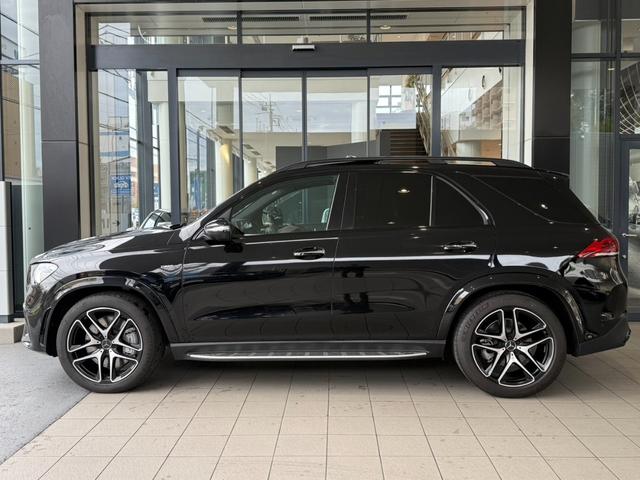 GLE GLE53 4マチック+ AMGインテリアカーボンP パノラマ 黒本革 3列シート ブルメスター 360°カメラ アンビエントライト温冷カップホルダー パフュームアトマイザー ヘッドアップディスプレイ 認定中古車保証(3枚目)