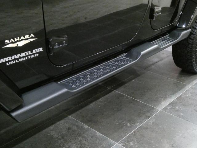 ジープ・ラングラーアンリミテッド サハラ　レザーＰＫＧ　前後ＲＵＧＧＥＤ　ＲＩＤＧＥバンパー　ＷＡＲＮ電動ウィンチ　ＲＡＮＣＨＯリフトアップショック／サス　前後ラテラルロッド　ＲＯＵＧＨ　ＣＯＵＮＴＲＹデュアルステアリングスタビ　ＣＡＲＯＺＺＥＲＩＡナビ／地デジ　１７ＡＷ　構造変更済（19枚目）