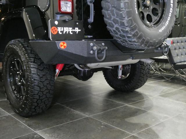 ジープ・ラングラーアンリミテッド サハラ　レザーＰＫＧ　前後ＲＵＧＧＥＤ　ＲＩＤＧＥバンパー　ＷＡＲＮ電動ウィンチ　ＲＡＮＣＨＯリフトアップショック／サス　前後ラテラルロッド　ＲＯＵＧＨ　ＣＯＵＮＴＲＹデュアルステアリングスタビ　ＣＡＲＯＺＺＥＲＩＡナビ／地デジ　１７ＡＷ　構造変更済（26枚目）