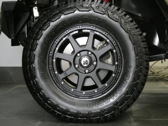 ジープ・ラングラーアンリミテッド サハラ　レザーＰＫＧ　前後ＲＵＧＧＥＤ　ＲＩＤＧＥバンパー　ＷＡＲＮ電動ウィンチ　ＲＡＮＣＨＯリフトアップショック／サス　前後ラテラルロッド　ＲＯＵＧＨ　ＣＯＵＮＴＲＹデュアルステアリングスタビ　ＣＡＲＯＺＺＥＲＩＡナビ／地デジ　１７ＡＷ　構造変更済（27枚目）