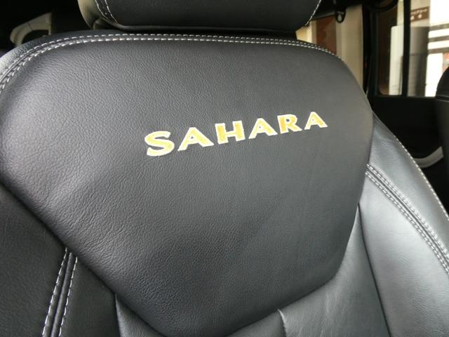 ジープ・ラングラーアンリミテッド サハラ　レザーＰＫＧ　前後ＲＵＧＧＥＤ　ＲＩＤＧＥバンパー　ＷＡＲＮ電動ウィンチ　ＲＡＮＣＨＯリフトアップショック／サス　前後ラテラルロッド　ＲＯＵＧＨ　ＣＯＵＮＴＲＹデュアルステアリングスタビ　ＣＡＲＯＺＺＥＲＩＡナビ／地デジ　１７ＡＷ　構造変更済（53枚目）