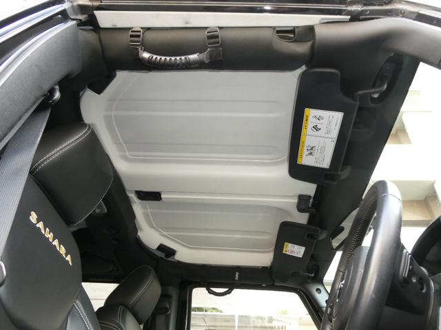 ジープ・ラングラーアンリミテッド サハラ　レザーＰＫＧ　前後ＲＵＧＧＥＤ　ＲＩＤＧＥバンパー　ＷＡＲＮ電動ウィンチ　ＲＡＮＣＨＯリフトアップショック／サス　前後ラテラルロッド　ＲＯＵＧＨ　ＣＯＵＮＴＲＹデュアルステアリングスタビ　ＣＡＲＯＺＺＥＲＩＡナビ／地デジ　１７ＡＷ　構造変更済（54枚目）