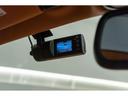 リュクス　新車保証付　認定中古車　パノラミックプライバシーガラスルーフ　スポーツイグゾースト　ジェットブラックスーパーファブリック　右ハンドル　パーキングセンサー　リアカメラ　リフター（15枚目）