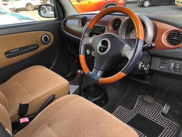 ミラジーノ プレミアムＬ　特別仕様車ＭＯＭＯステ純正ＡＷ木目エアコンラジオ（6枚目）