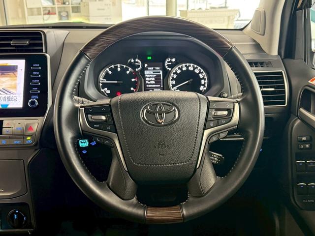 ランドクルーザープラド ＴＸ　Ｌパッケージ　マットブラックエディション　ディーゼルターボ　４ＷＤ　７人乗・メーカーナビ・３６０度カメラ・ウッドコンビステアリング・デジタルインナーミラー（24枚目）