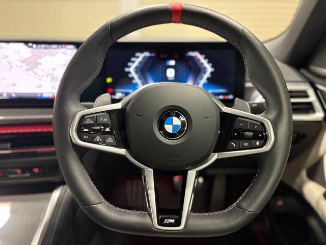 ４シリーズ Ｍ４４０ｉ　ｘＤｒｉｖｅカブリオレ　新車保証　１９インチＡＷ　Ｍカーボンエクステリアパッケージ　アンソラジットシルバーエフェクトソフトトップ　３６０度カメラ　カーブドディスプレイ（15枚目）