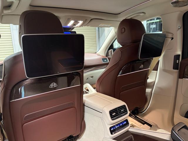 GLS GLS600 4マチック 1年保証 マホガニーブラウンナッパレザー ブラウンウォールナット 後席左右独立シート クーリングボックス 専用シャンパングラス格納 リアエンターテイメント ブルメスター3Dサラウンド 360カメラ(26枚目)