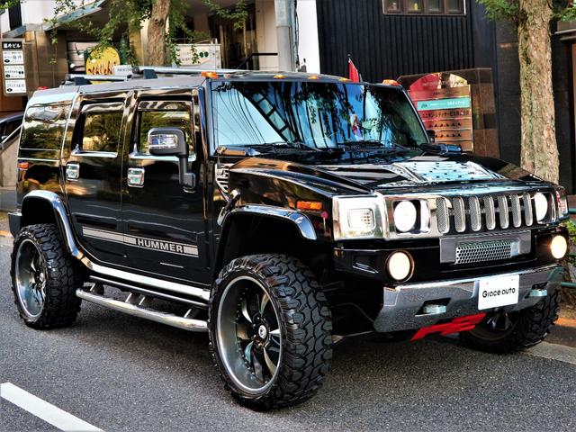 ディーラー車・24AW・新品MTタイヤ・ギブソン左右マフラー ・ASANTI・超ワイドスペーサ-・前後クロ-ムバンパ-・サイドデカール・アルカンタラ張替・カスタム音響・前席Wモニタ-・後席モニター3発・特注グラフィックパネル・ブルガリ・サンルーフ・黒革・記録簿有(32枚目)