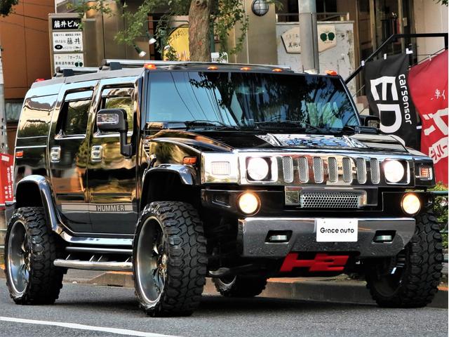 ディーラー車・24AW・新品MTタイヤ・ギブソン左右マフラー ・ASANTI・超ワイドスペーサ-・前後クロ-ムバンパ-・サイドデカール・アルカンタラ張替・カスタム音響・前席Wモニタ-・後席モニター3発・特注グラフィックパネル・ブルガリ・サンルーフ・黒革・記録簿有(34枚目)
