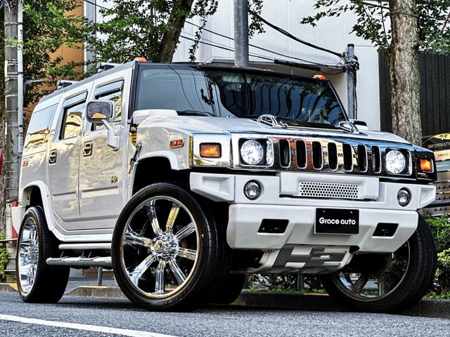 ハマーＨ２ タイプＧ・新車並行車・実走行・社外２６ＡＷ・バンパー同色加工　・後期黒革・サンルーフ・社外クロームパーツ・社外サイドＳＴＥＰ・２６インチ背面タイヤ・ルーフキャリア・シートヒーター・３列席・電動シート・ナビ・カメラ・ＨＩＤ・ＥＴＣ・キーレス・スペアキー・整備記録有（37枚目）