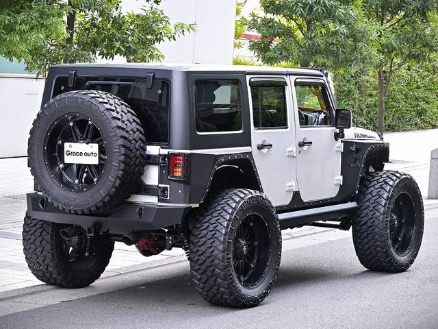 ジープ・ラングラーアンリミテッド ルビコン・ハードロック・フルカスタム・新品電動サイドステップ ・リフトUP・FUEL24in・金属製アーマーフェンダー・社外バンパー・社外グリル・LEDライト・マグナフロー2本出しマフラー・FOX足廻り・社外デフカバー・社外ロールケージ・LEDアンビエントライト(7枚目)