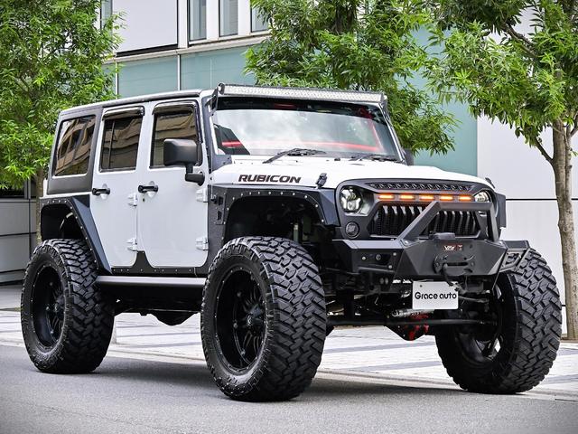 ジープ・ラングラーアンリミテッド ルビコン・ハードロック・フルカスタム・新品電動サイドステップ ・リフトUP・FUEL24in・金属製アーマーフェンダー・社外バンパー・社外グリル・LEDライト・マグナフロー2本出しマフラー・FOX足廻り・社外デフカバー・社外ロールケージ・LEDアンビエントライト(9枚目)